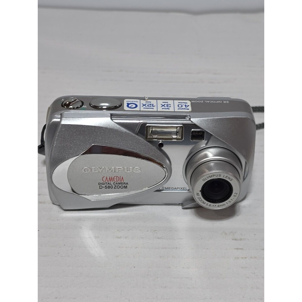 Olympus Camedia D-580 4MP Silver 1.8″ LCD 3x Optical Zoom Compact Digital Camera - Picture 8 of 9